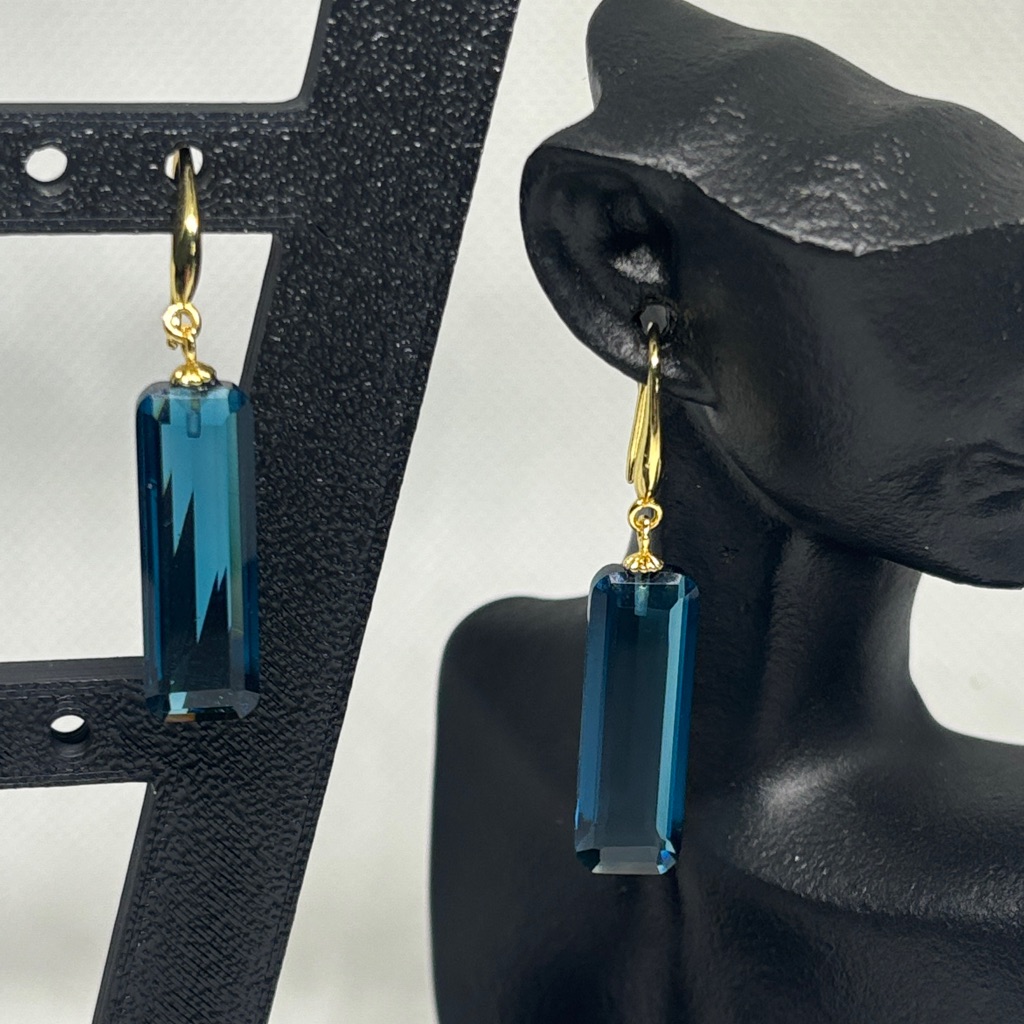 Swiss Blue Topaz Baguette Earrings In Gold Tone Sterling Silver